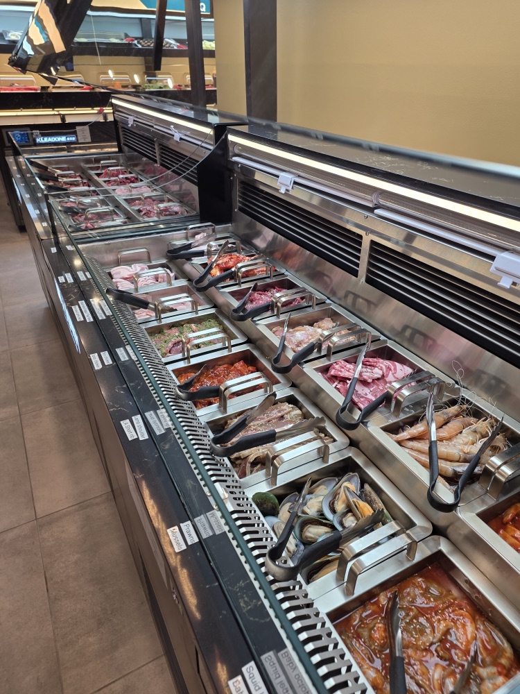 Korean BBQ buffet meat and seafood selection